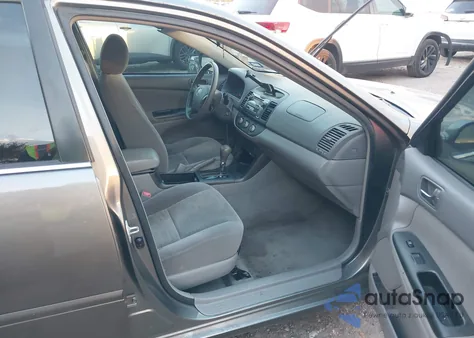 2006 Toyota Camry Le from USA, damaged, VIN 4T1BE32KX6U735009